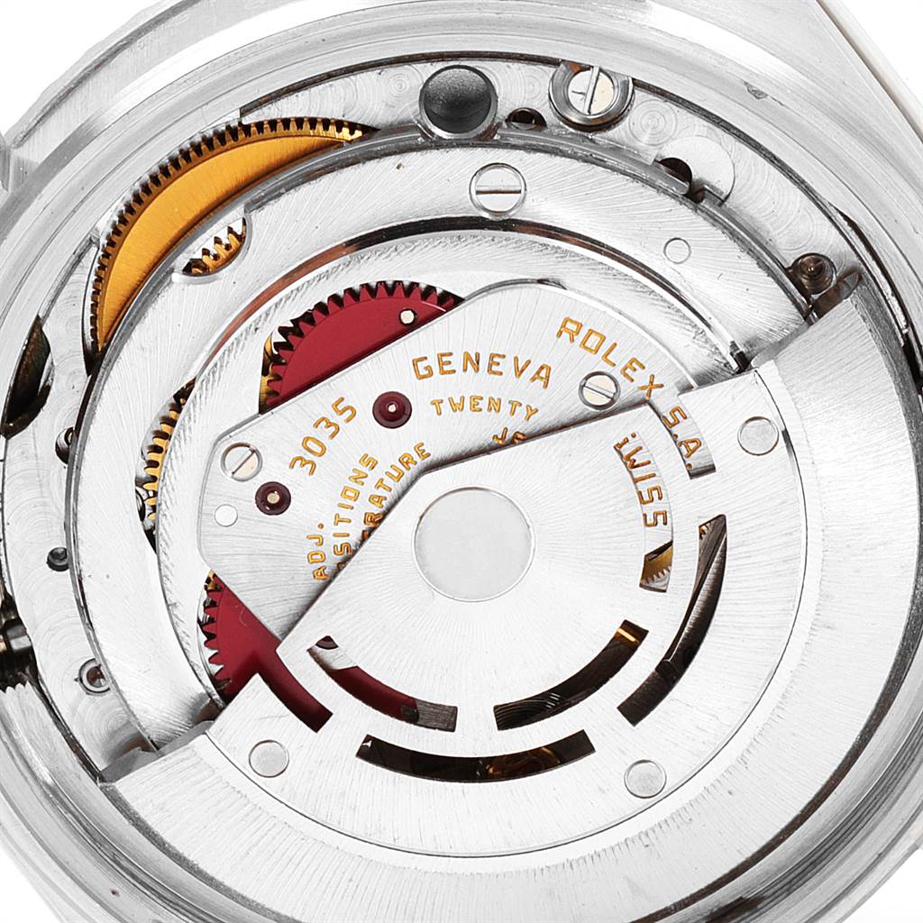 This image shows the inner mechanical movement of the Vintage Collection model by Rolex, viewed from the back.