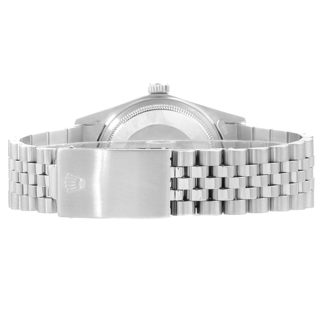 This image shows the clasp and the back of the stainless steel bracelet of the Vintage Collection Rolex watch.