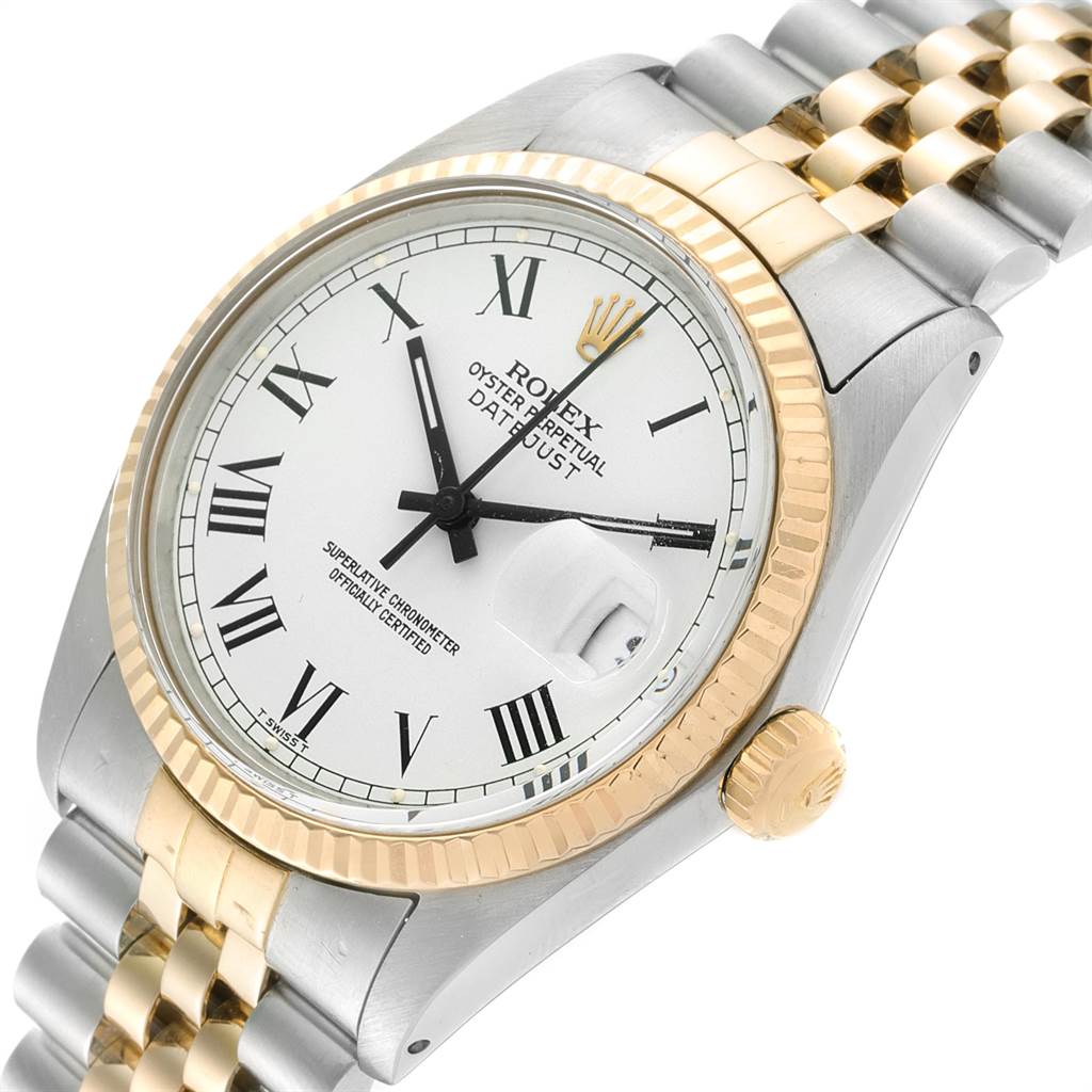 The image shows a close-up angled view of the Vintage Collection Rolex Oyster Perpetual Datejust, highlighting the dial, bezel, crown, and bracelet.