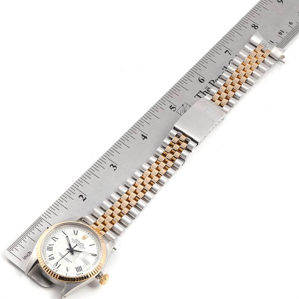 The image shows a Rolex Vintage Collection 16013 Men's Stainless Steel White Dial 16013 Men's Stainless Steel White Dial watch at an overhead angle, featuring the dial, bezel, and part of the metal bracelet.