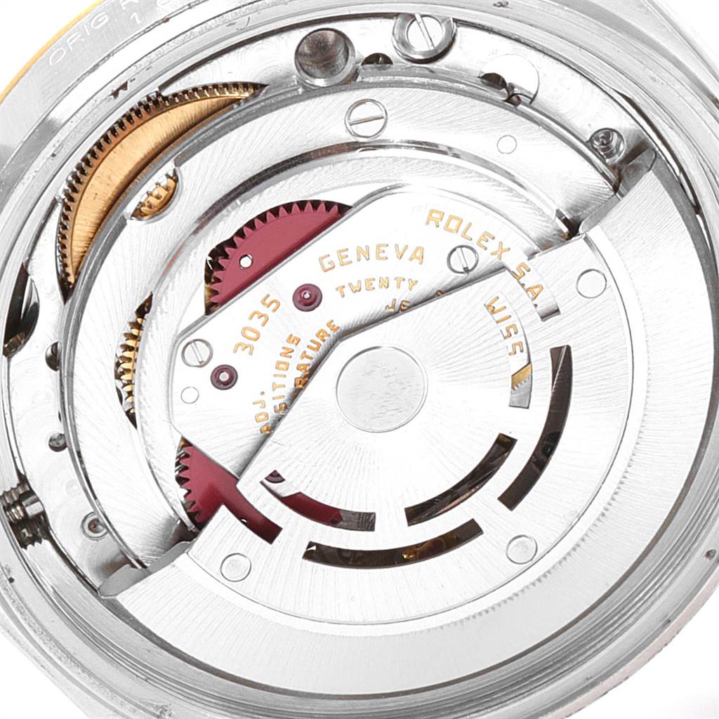 The image shows the internal movement mechanism of the Vintage Collection model by Rolex, viewed from the back.