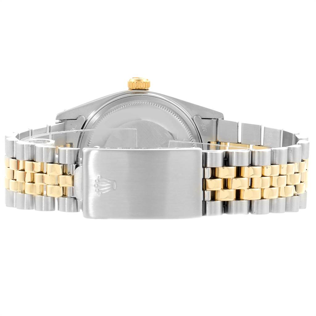 The image shows the back view of the Rolex Vintage Collection 16013 Men's Stainless Steel Black Dial 16013 Men's Stainless Steel Black Dial watch, highlighting its two-tone bracelet and clasp.