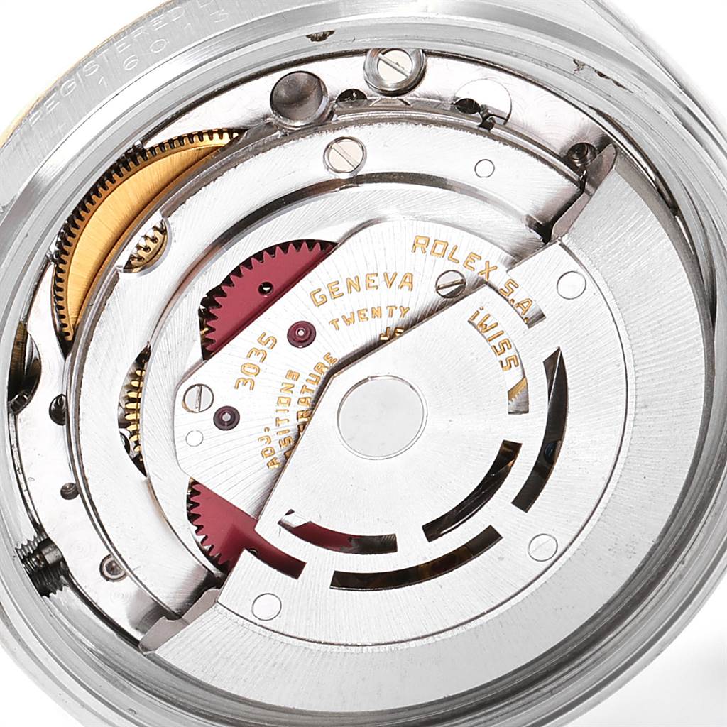 The image shows a close-up view of the internal mechanism of a Rolex Vintage Collection 16013 Men's Stainless Steel Black Dial 16013 Men's Stainless Steel Black Dial watch.