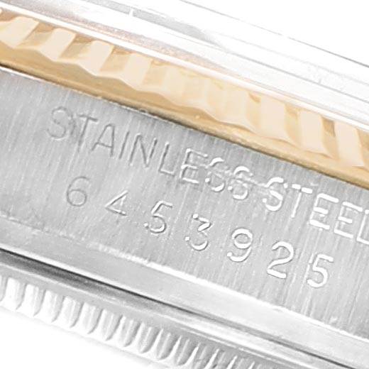 The image shows a close-up of the case side with serial number engraving on a Vintage Collection Rolex watch.