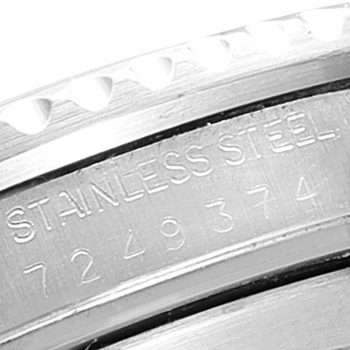 This close-up image shows the stainless steel casing and serial number of the Rolex Vintage Collection 16800 Men's Stainless Steel Black Dial 16800 Men's Stainless Steel Black Dial model watch.