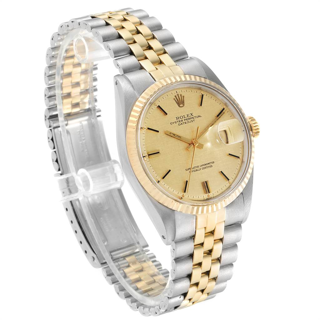 This image shows a Rolex Vintage Collection 1601 Men
s Steel and Gold (two tone) Champagne Dial 1601 Men
s Steel and Gold (two tone) Champagne Dial watch at a slight angle, highlighting the bezel, dial, and two-tone bracelet.