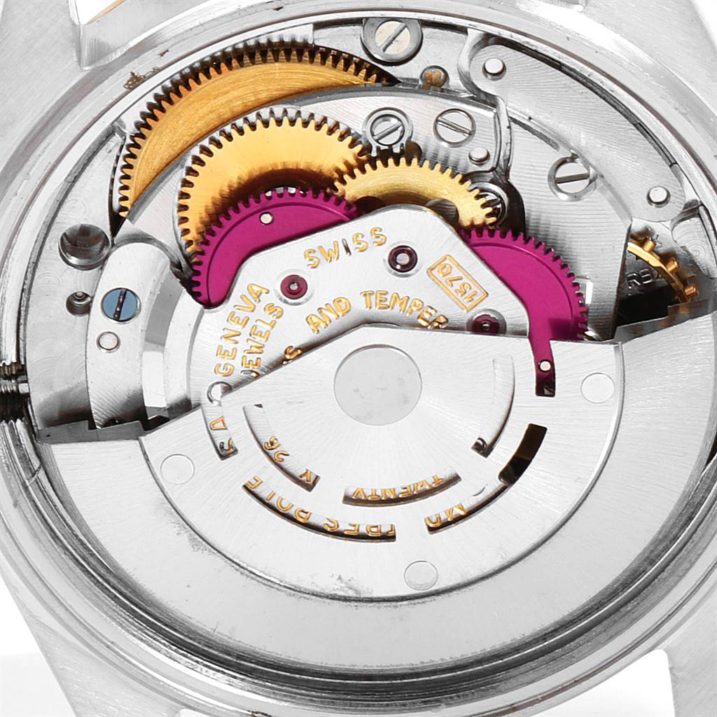 The image shows a close-up view of the internal mechanical movement of a Vintage Collection model by Rolex.