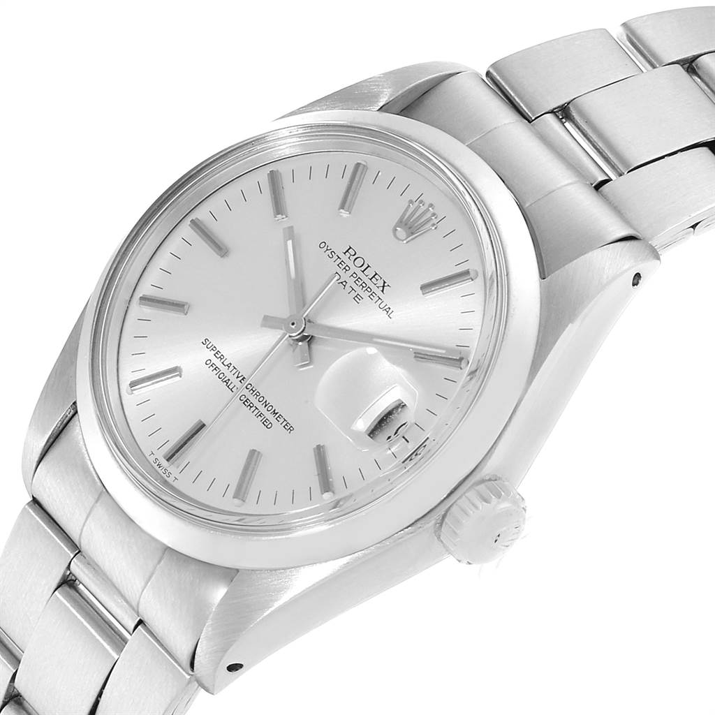 This image shows a tilted view of the Rolex Vintage Collection 1500 Men's Stainless Steel Silver Dial 1500 Men's Stainless Steel Silver Dial watch, highlighting the dial, crown, and stainless steel band.