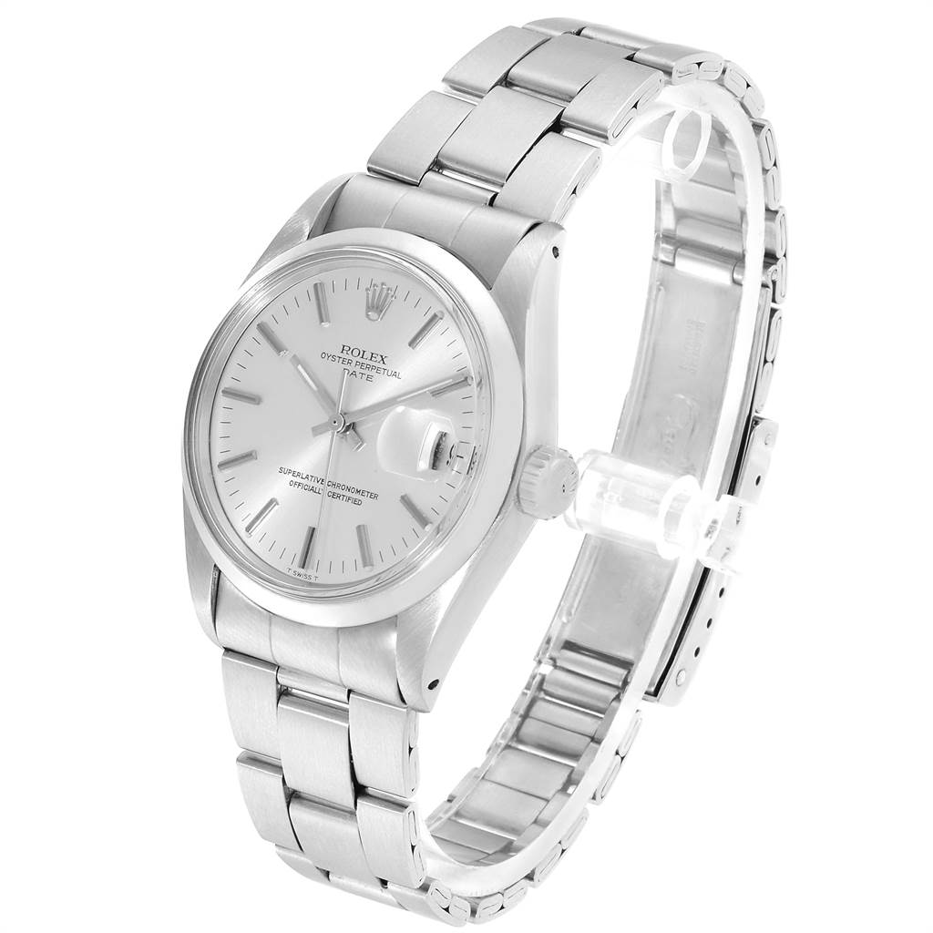 The Vintage Collection Rolex watch is shown at a slight angle, displaying its face, case, and metal bracelet.