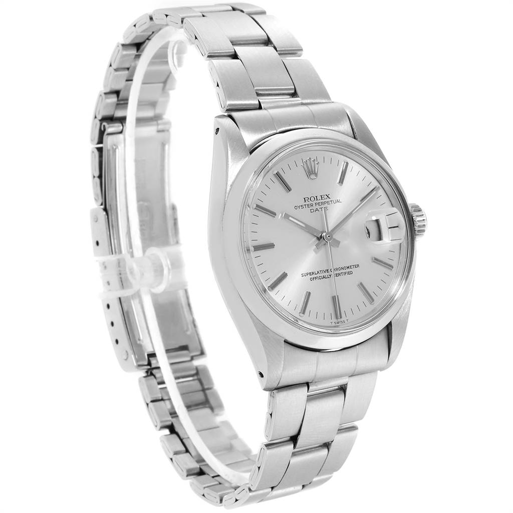 The image shows a Vintage Collection Rolex Oyster Perpetual Date watch with a silver dial, stainless steel case, and bracelet at a slight angle.