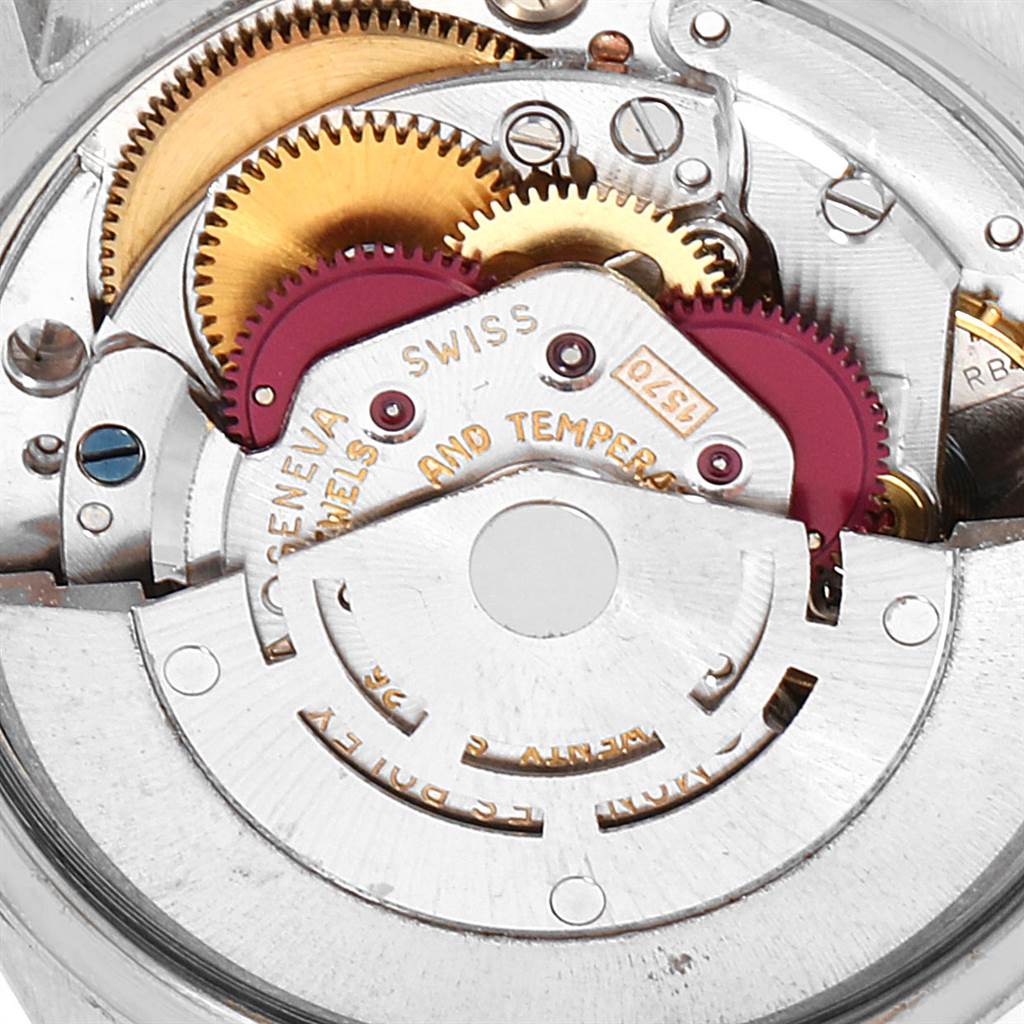 This close-up image shows the intricate inner mechanism of the Rolex Vintage Collection 1500 Men's Stainless Steel Silver Dial 1500 Men's Stainless Steel Silver Dial watch.