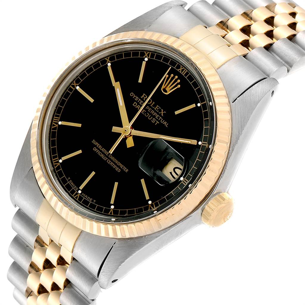 The image shows a Rolex Vintage Collection 16013 Men
s Stainless Steel Black Dial 16013 Men
s Stainless Steel Black Dial watch at an angled view, highlighting its black dial, gold bezel, and two-tone bracelet.