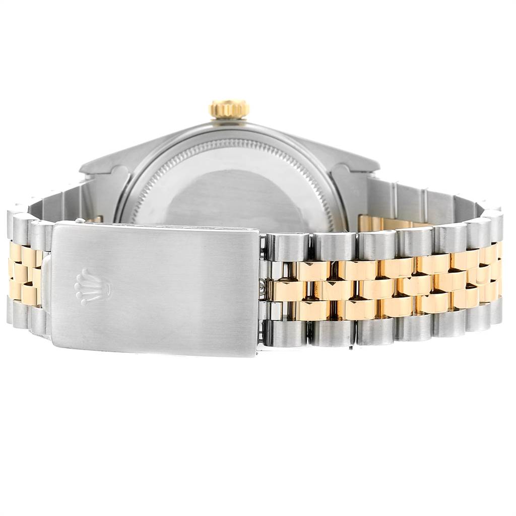 The image shows the back view of a Rolex Vintage Collection 16013 Men
s Stainless Steel Black Dial 16013 Men
s Stainless Steel Black Dial watch, highlighting the case back, crown, and two-tone bracelet with clasp.