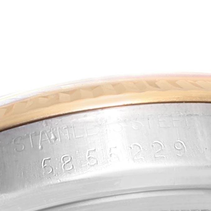 Close-up of the bezel and case side showing engraving details on a Rolex Vintage Collection 16013 Men
s Stainless Steel Black Dial 16013 Men
s Stainless Steel Black Dial watch.