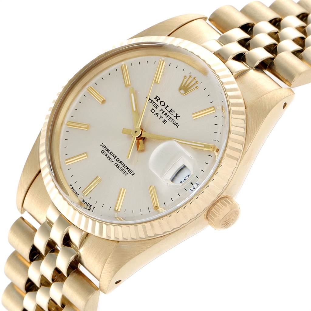 The Rolex Vintage Collection 1503 Men
s Yellow Gold Silver Dial 1503 Men
s Yellow Gold Silver Dial watch is shown at a slight angle, highlighting its gold case, bracelet, dial, and cyclops lens.