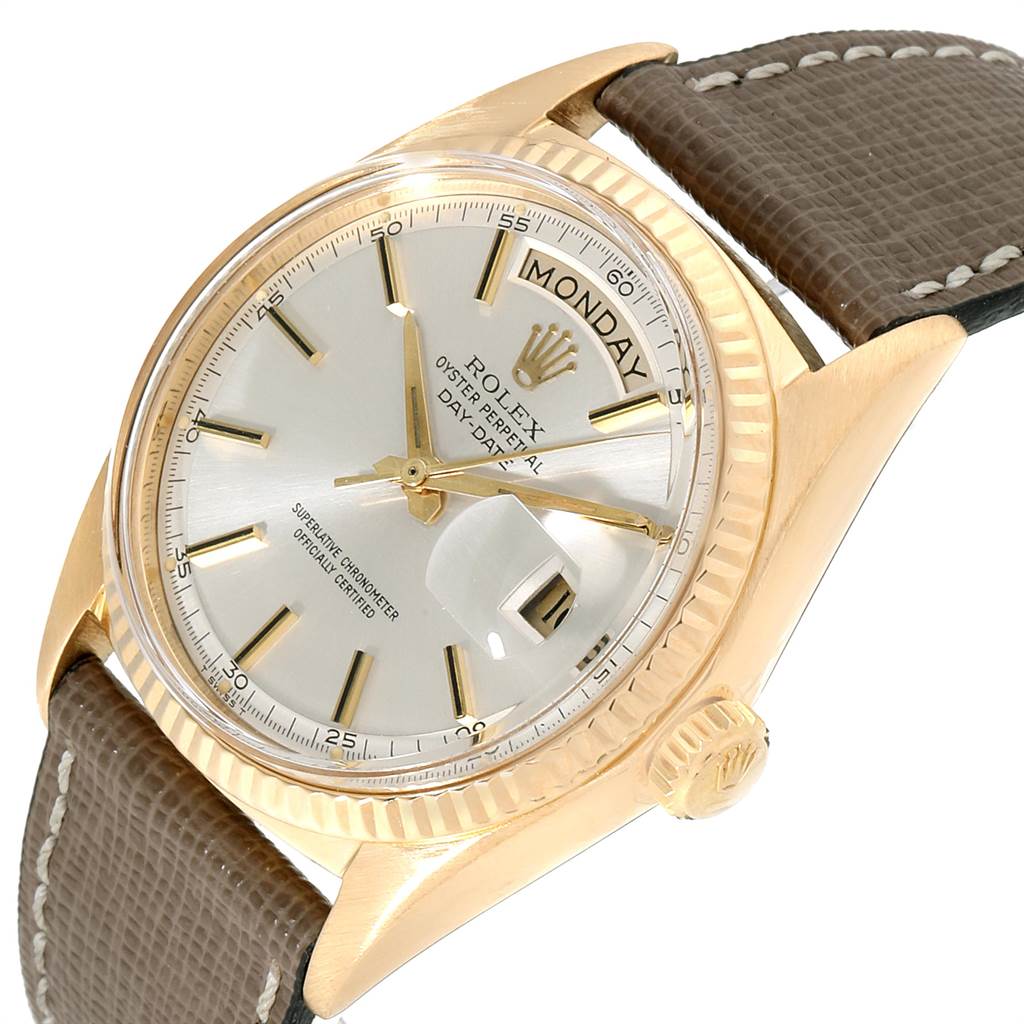 The Rolex Vintage Collection 1803 Men's Yellow Gold Silver Dial 1803 Men's Yellow Gold Silver Dial model watch is shown from a three-quarter angle, highlighting the watch face, crown, and brown strap.