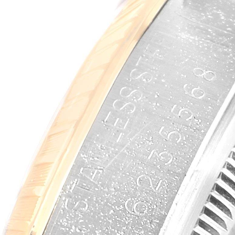 This close-up image shows the side view of the bezel and case of a Vintage Collection model by Rolex.