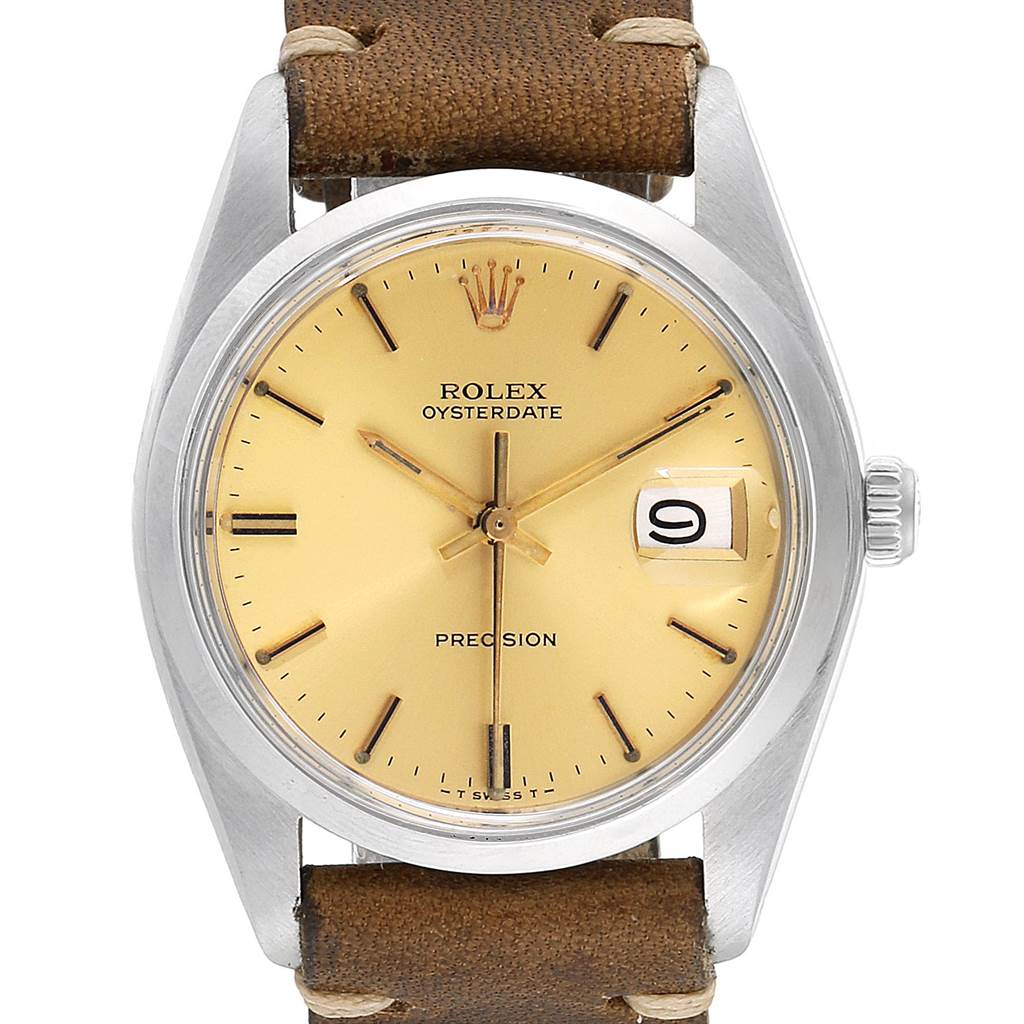 This image shows a front view of the Rolex Vintage Collection 6694 Men's Stainless Steel Champagne Dial 6694 Men's Stainless Steel Champagne Dial Oysterdate Precision watch, highlighting the watch face and brown leather strap.