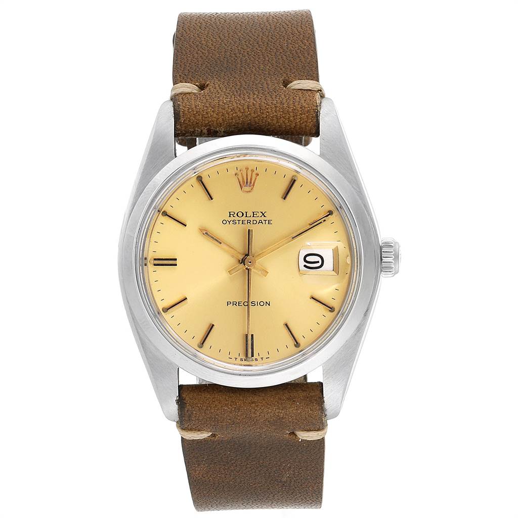 This image shows a front view of a Rolex Vintage Collection 6694 Men's Stainless Steel Champagne Dial 6694 Men's Stainless Steel Champagne Dial model watch with a beige dial and brown leather strap.