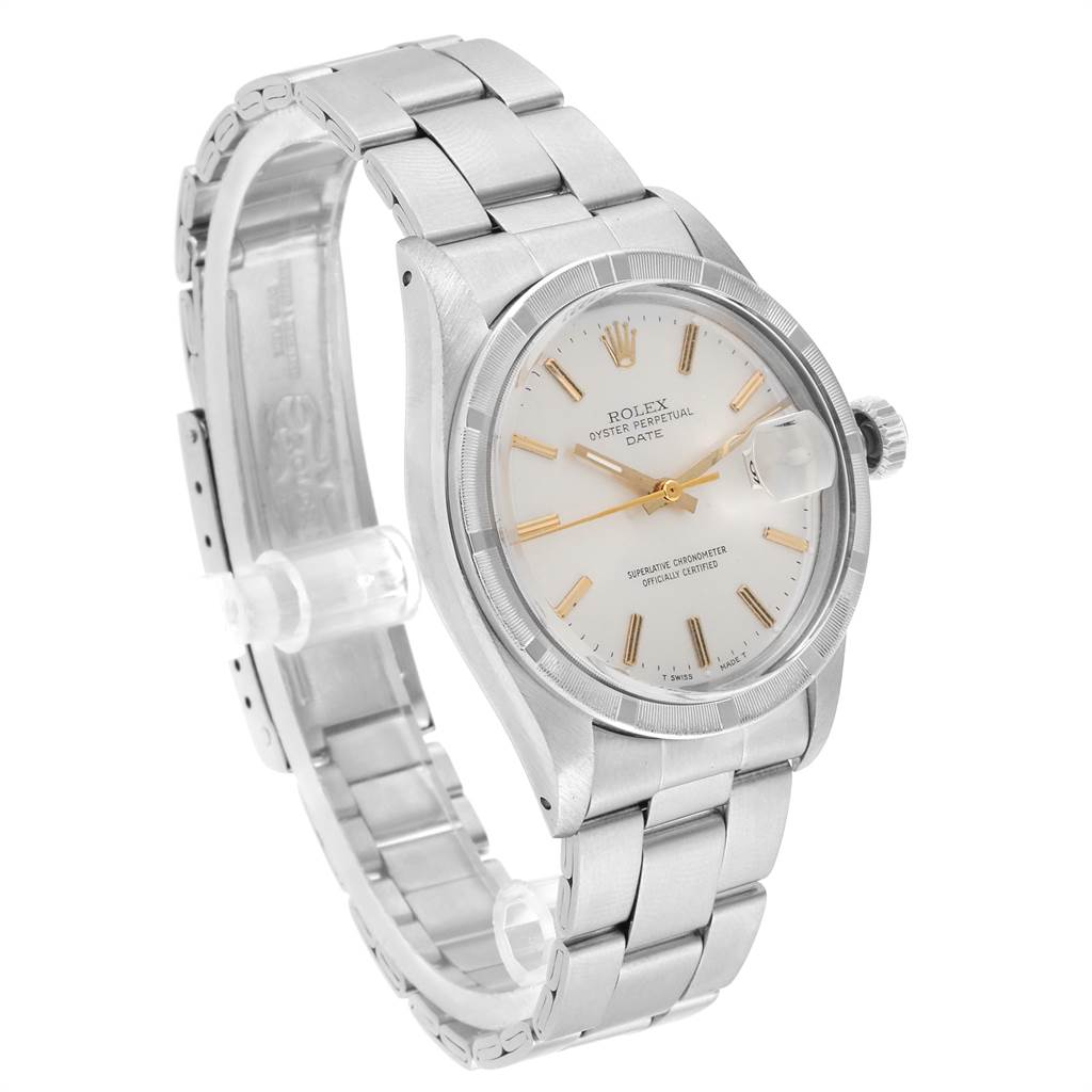 The Vintage Collection Rolex watch is shown at an angle displaying the dial, stainless steel bracelet, and crown.