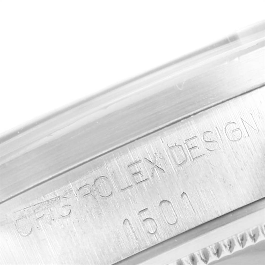 This is a close-up angle showing the engraved serial number and "Rolex Design" text on the edge of the Rolex Vintage Collection 1501 Men's Stainless Steel Silver Dial 1501 Men's Stainless Steel Silver Dial model.