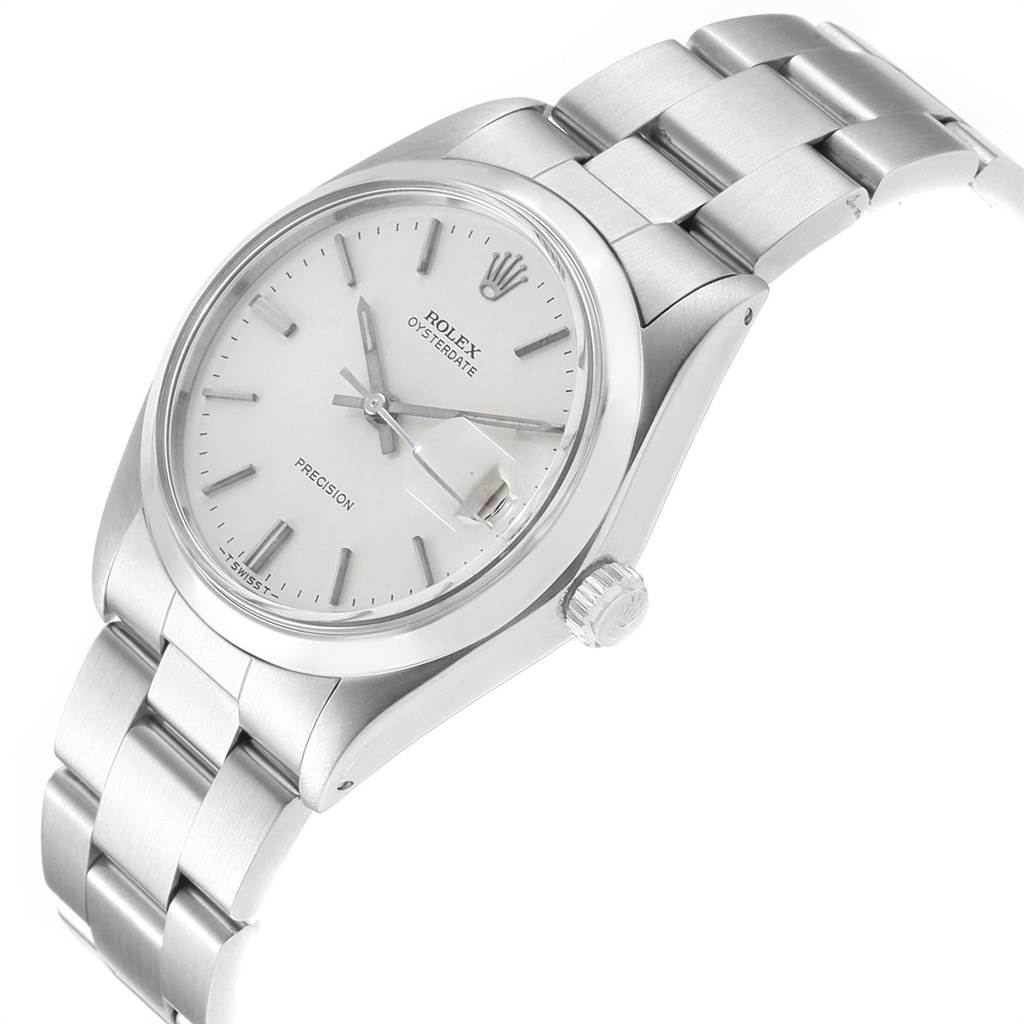 The image shows an angled view of the Rolex Vintage Collection 6694 Men's Stainless Steel Silver Dial 6694 Men's Stainless Steel Silver Dial watch, displaying its dial, crown, and portion of the bracelet.