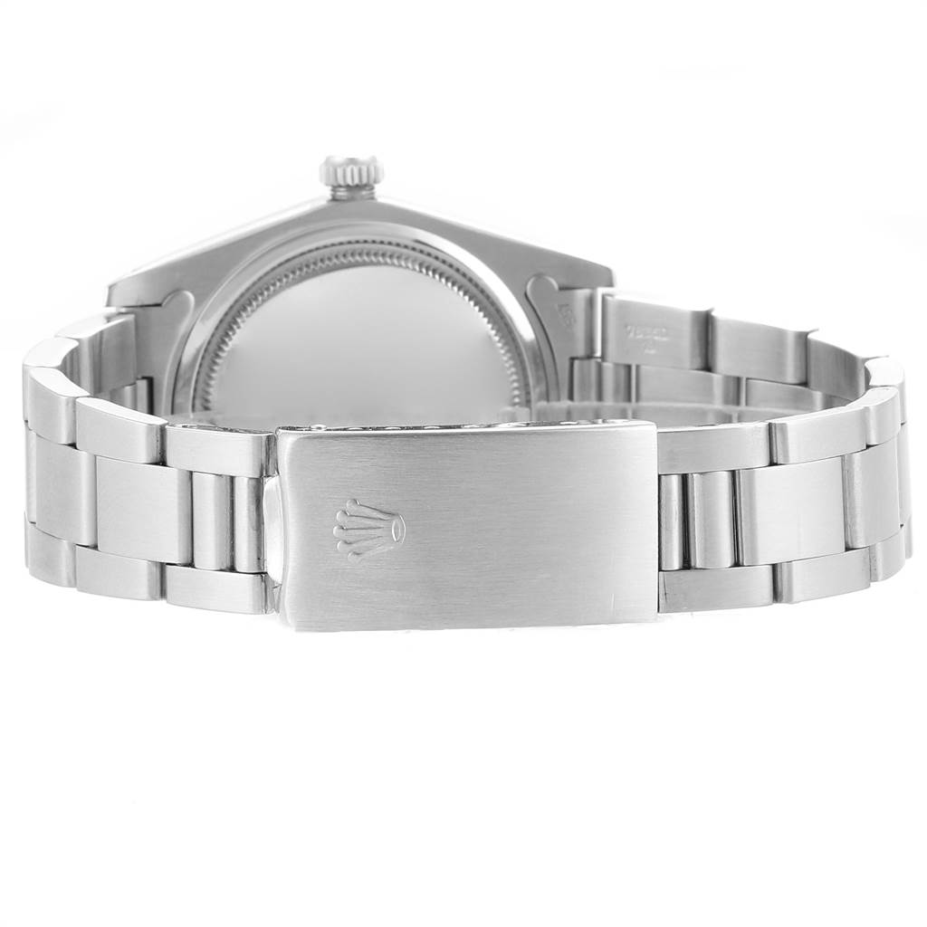 The image shows the back view of a Vintage Collection Rolex watch, highlighting the clasp and bracelet.