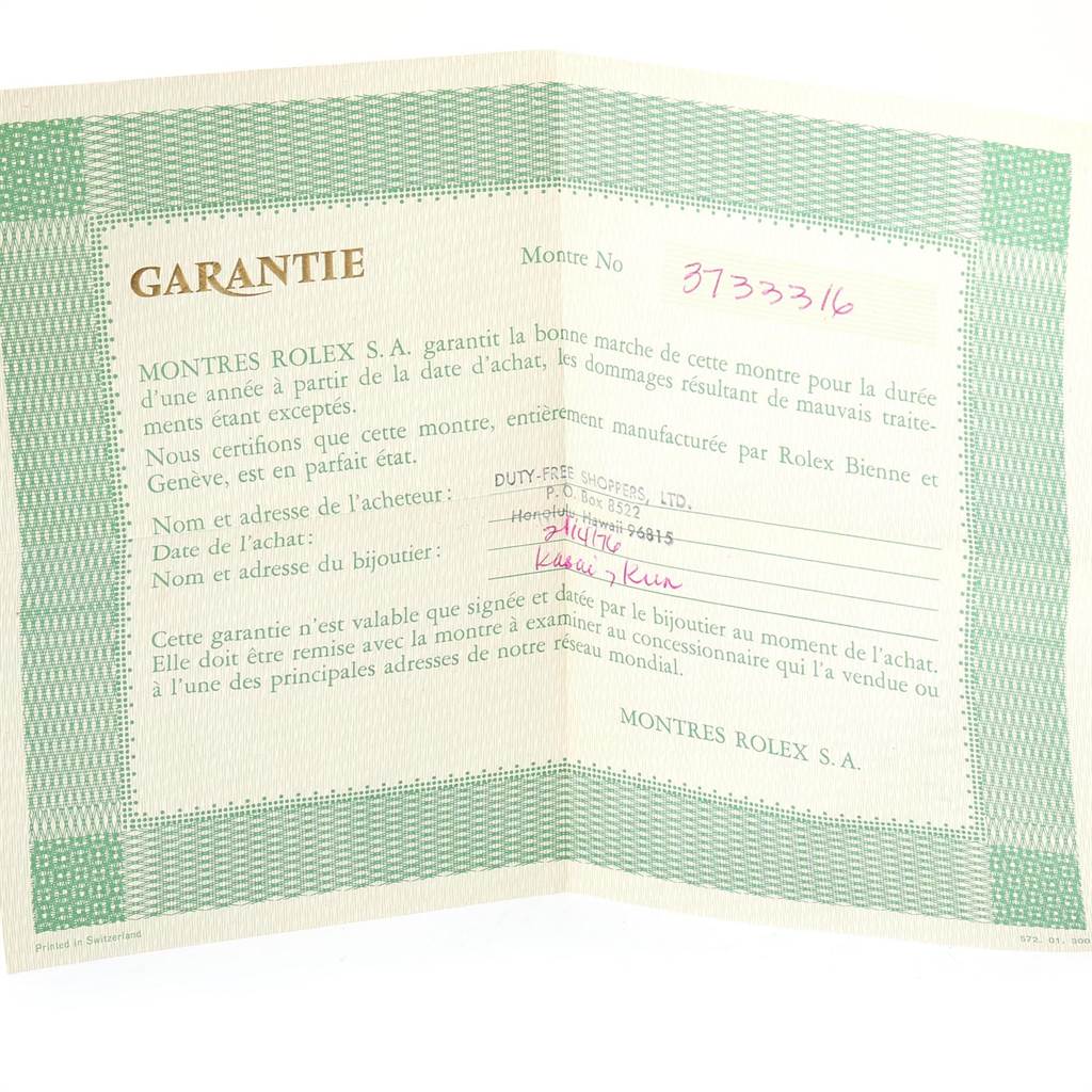 The image shows a warranty certificate for the Rolex Vintage Collection 6694 Men's Stainless Steel Silver Dial 6694 Men's Stainless Steel Silver Dial model, laid out flat with text and signatures visible.