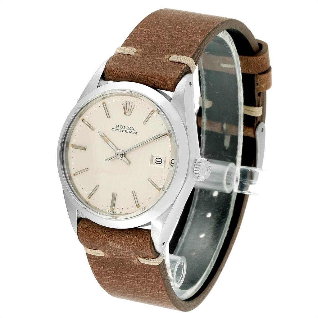 The Rolex Vintage Collection 6694 Men's Stainless Steel Silver Dial 6694 Men's Stainless Steel Silver Dial model is shown at a slight angle, featuring its dial, case, crown, and leather strap.