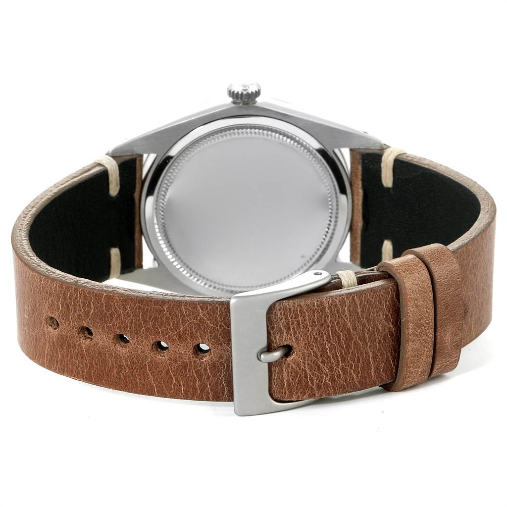 The image shows the back side and leather strap of the Rolex Vintage Collection 6694 Men's Stainless Steel Silver Dial 6694 Men's Stainless Steel Silver Dial watch, including the buckle.