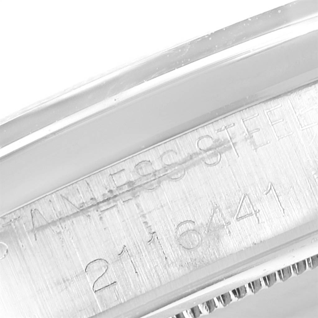This close-up image shows the stainless steel casing with engraved numbers of the Rolex Vintage Collection 6694 Men's Stainless Steel Silver Dial 6694 Men's Stainless Steel Silver Dial watch.