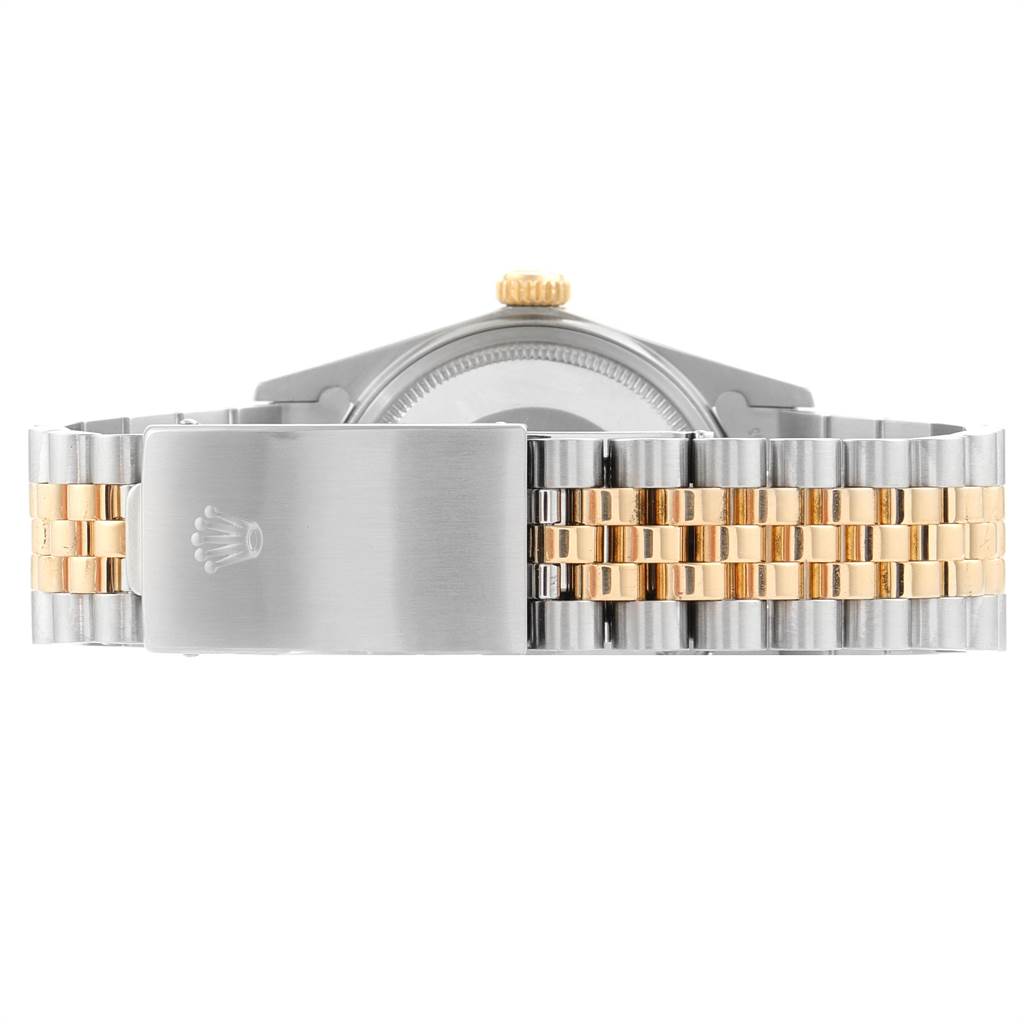 This image shows the back view of a Rolex Vintage Collection 16013 Men's Stainless Steel Champagne Dial 16013 Men's Stainless Steel Champagne Dial watch, focusing on its two-tone bracelet and clasp.