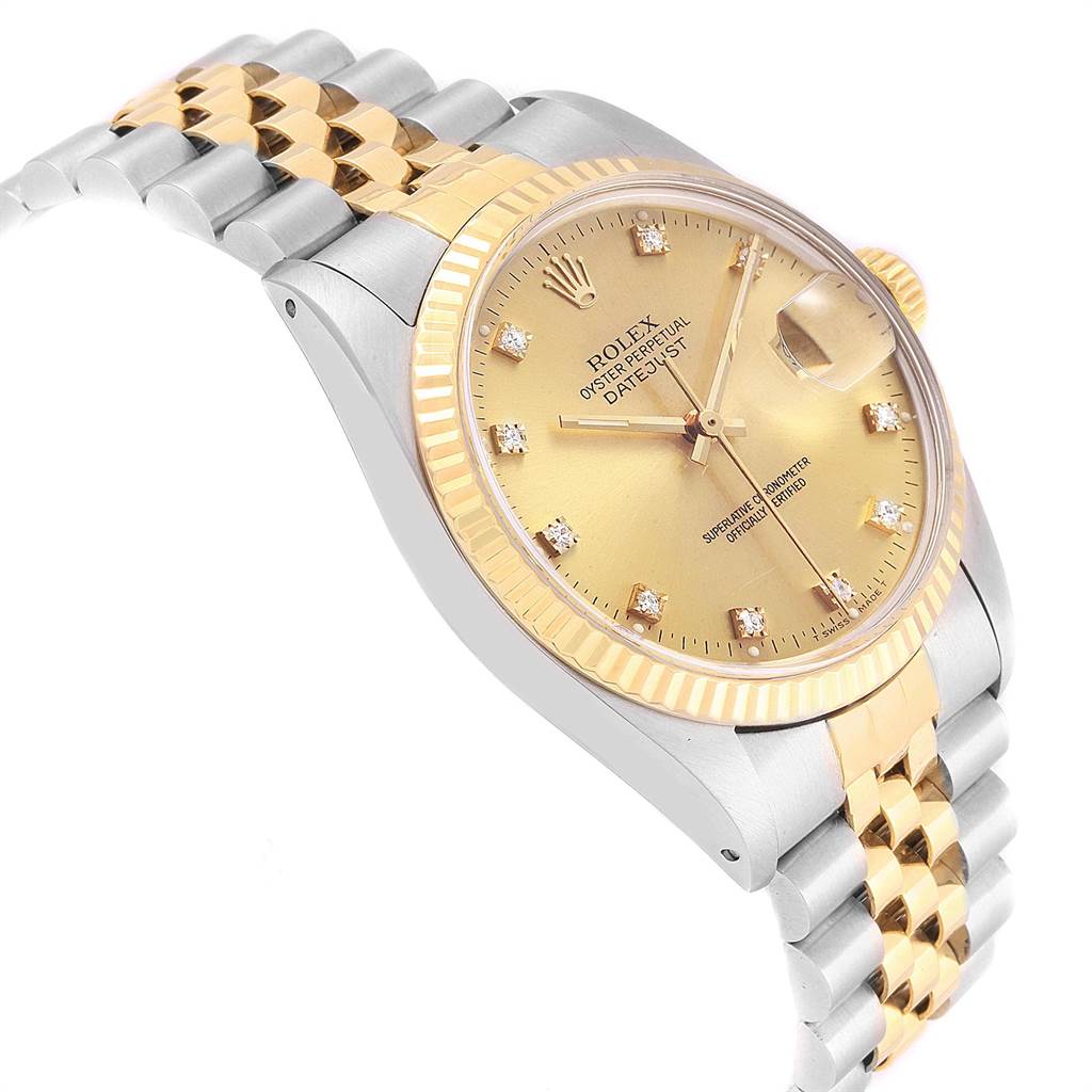 The image shows a Vintage Collection Rolex watch at a slight angle, highlighting its two-tone bracelet, face, and fluted bezel.