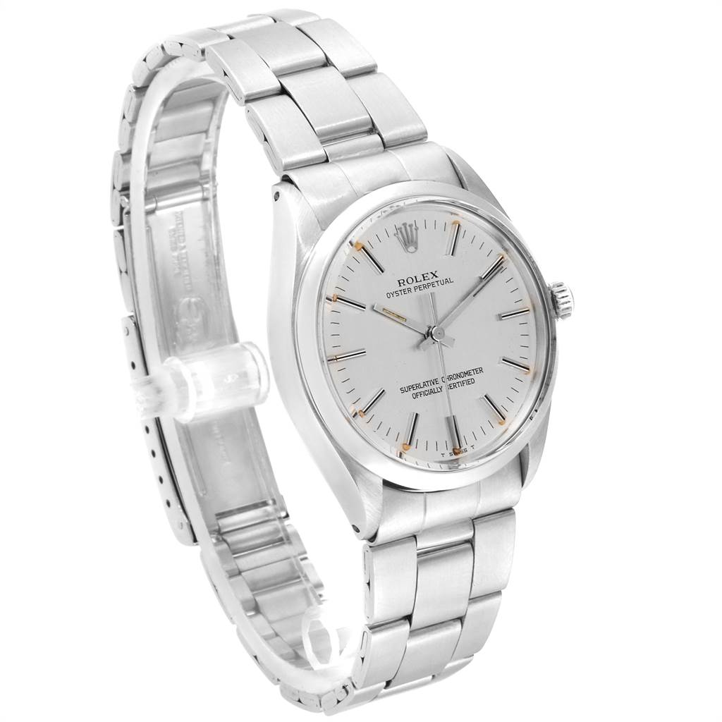 The image shows a side-angle view of a Rolex Vintage Collection 1002 Men's Stainless Steel Silver Dial 1002 Men's Stainless Steel Silver Dial watch, showcasing the silver bracelet, dial, and crown.
