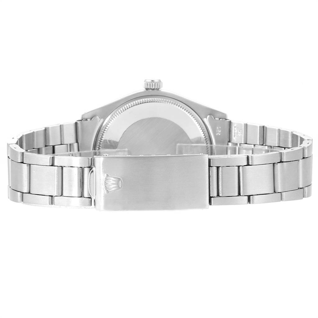 This image shows the back and clasp of a Rolex Vintage Collection 1002 Men's Stainless Steel Silver Dial 1002 Men's Stainless Steel Silver Dial watch, highlighting its stainless steel bracelet and case.