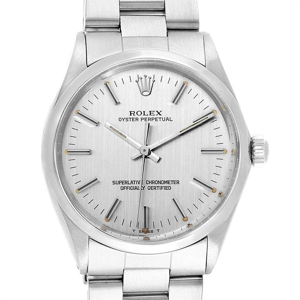 The image shows a front view of a Rolex Vintage Collection 1002 Men's Stainless Steel Silver Dial 1002 Men's Stainless Steel Silver Dial Oyster Perpetual watch displaying its dial, bracelet, crown, and hour markers.