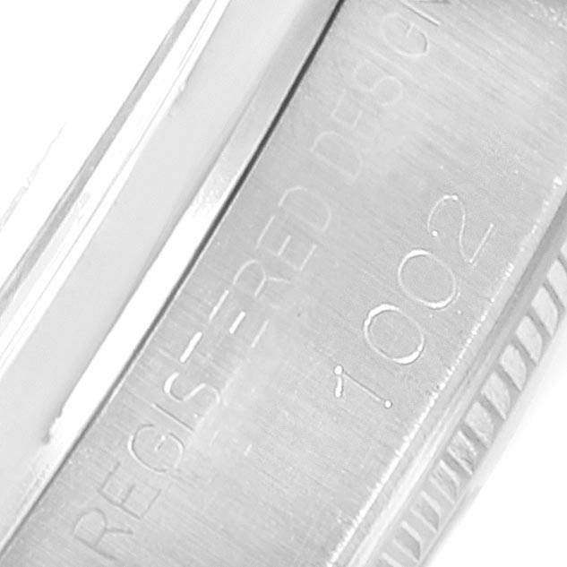 This close-up image shows the case side with engraved details of the Vintage Collection watch by Rolex.