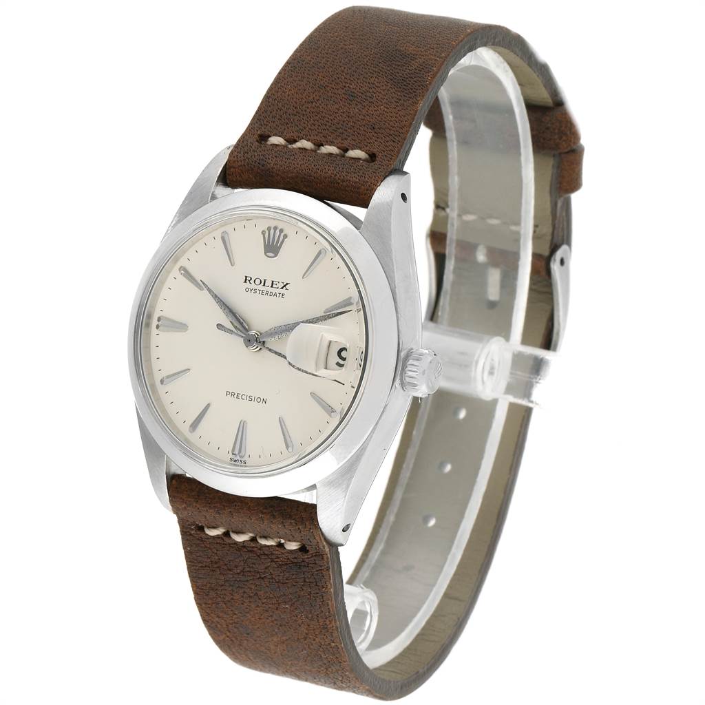The Rolex Vintage Collection 6694 Men's Stainless Steel Silver Dial 6694 Men's Stainless Steel Silver Dial watch is shown in a three-quarter view, highlighting its dial, hands, crown, and leather strap.