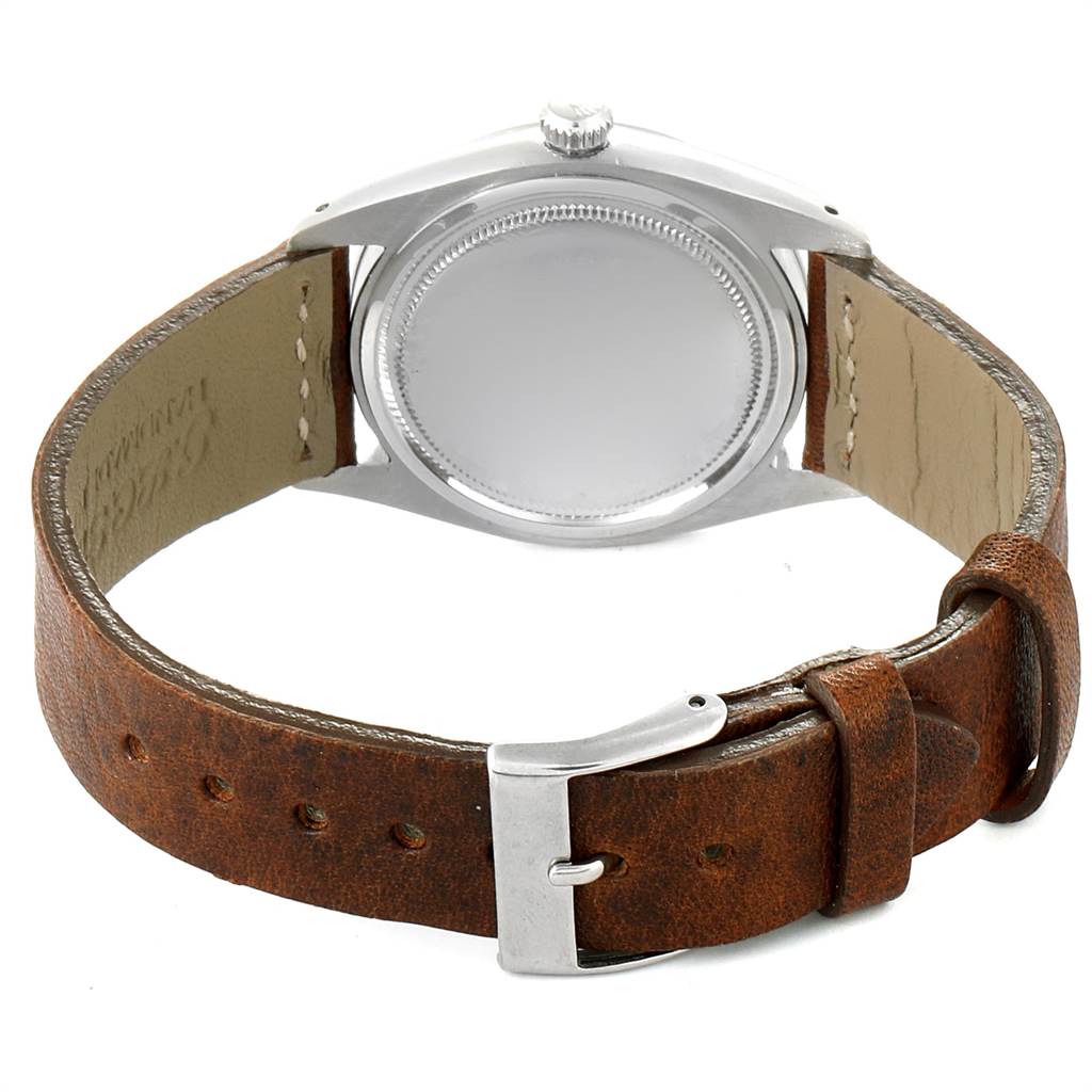 The image shows the back case and leather strap of a Rolex Vintage Collection 6694 Men's Stainless Steel Silver Dial 6694 Men's Stainless Steel Silver Dial watch.