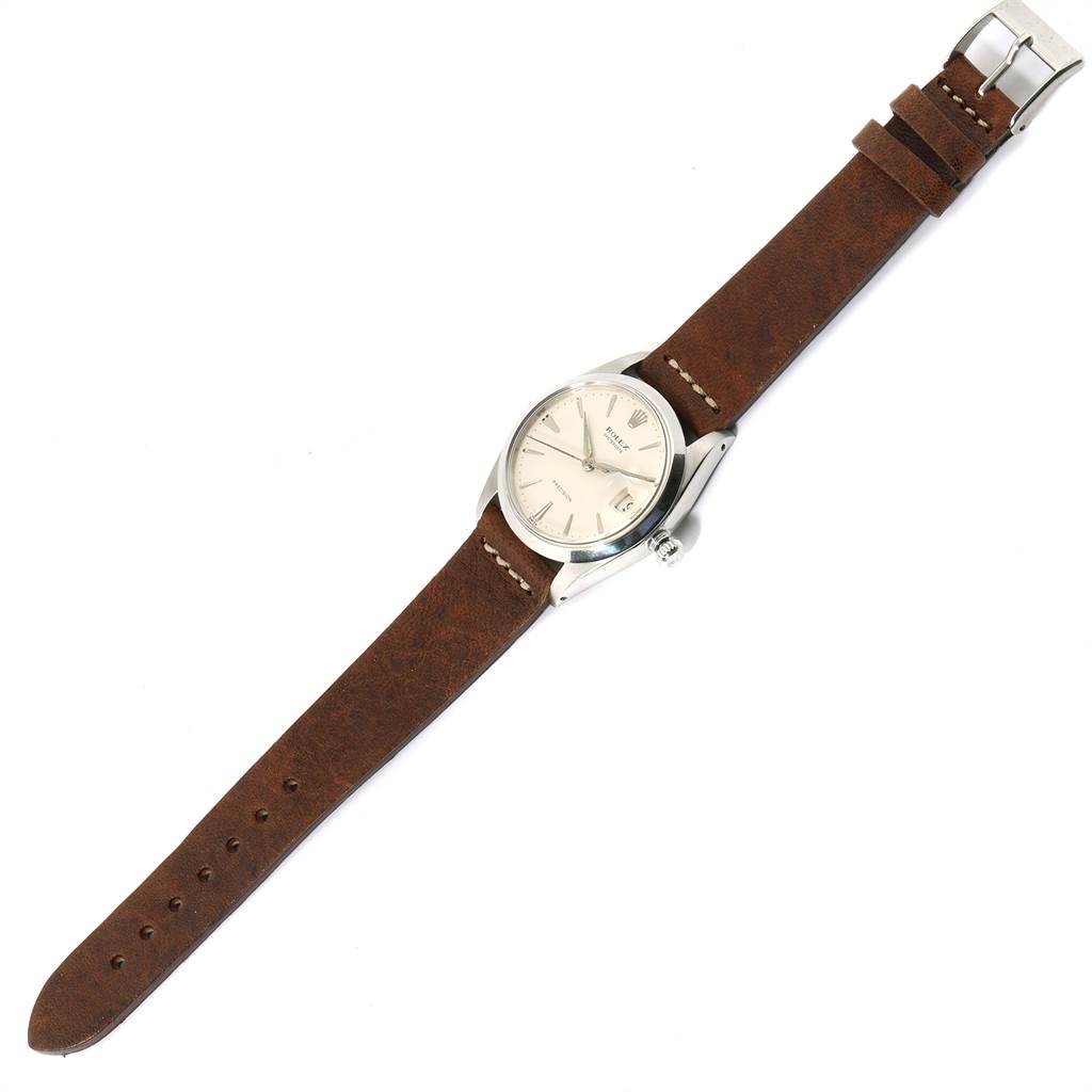 The Rolex Vintage Collection 6694 Men's Stainless Steel Silver Dial 6694 Men's Stainless Steel Silver Dial watch is shown flat with a brown leather strap visible.