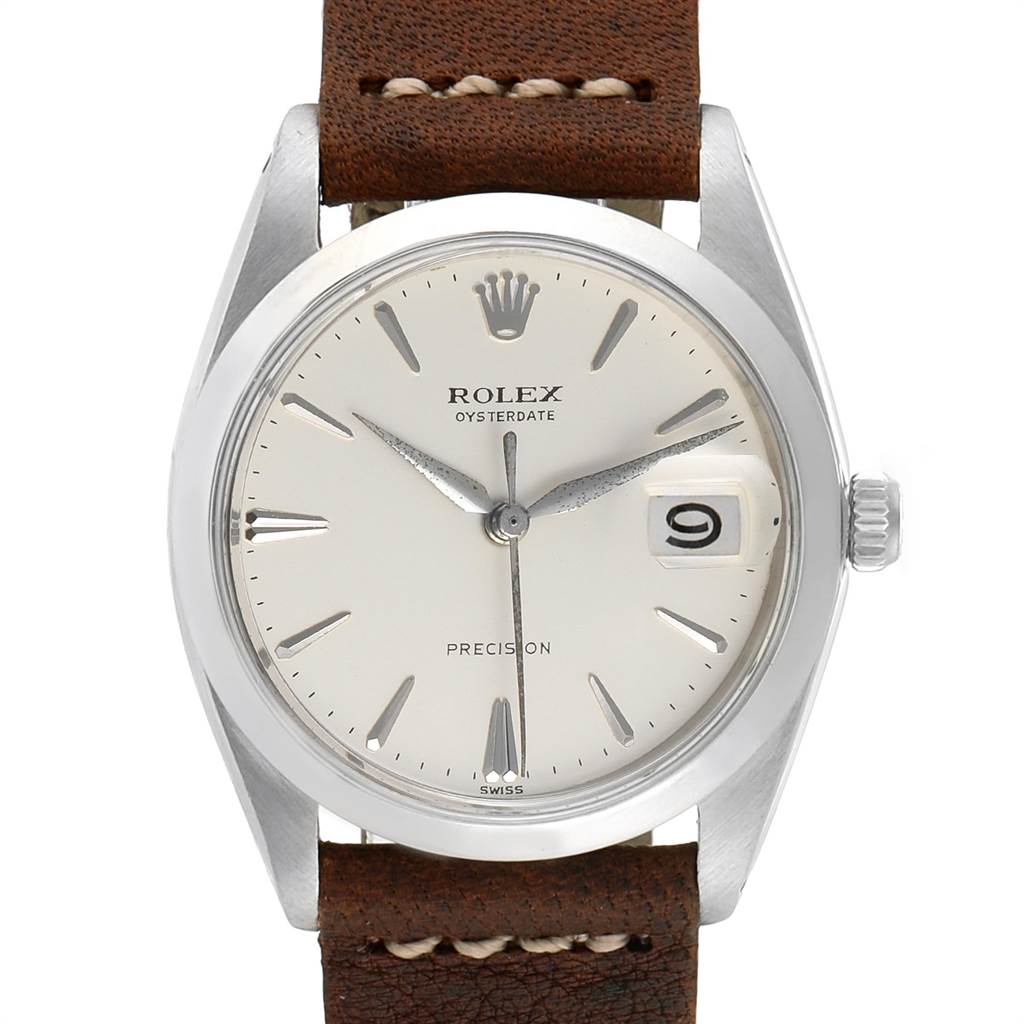 The image shows a front view of the Rolex Vintage Collection 6694 Men's Stainless Steel Silver Dial 6694 Men's Stainless Steel Silver Dial model, highlighting its dial, hands, date window, and leather strap.
