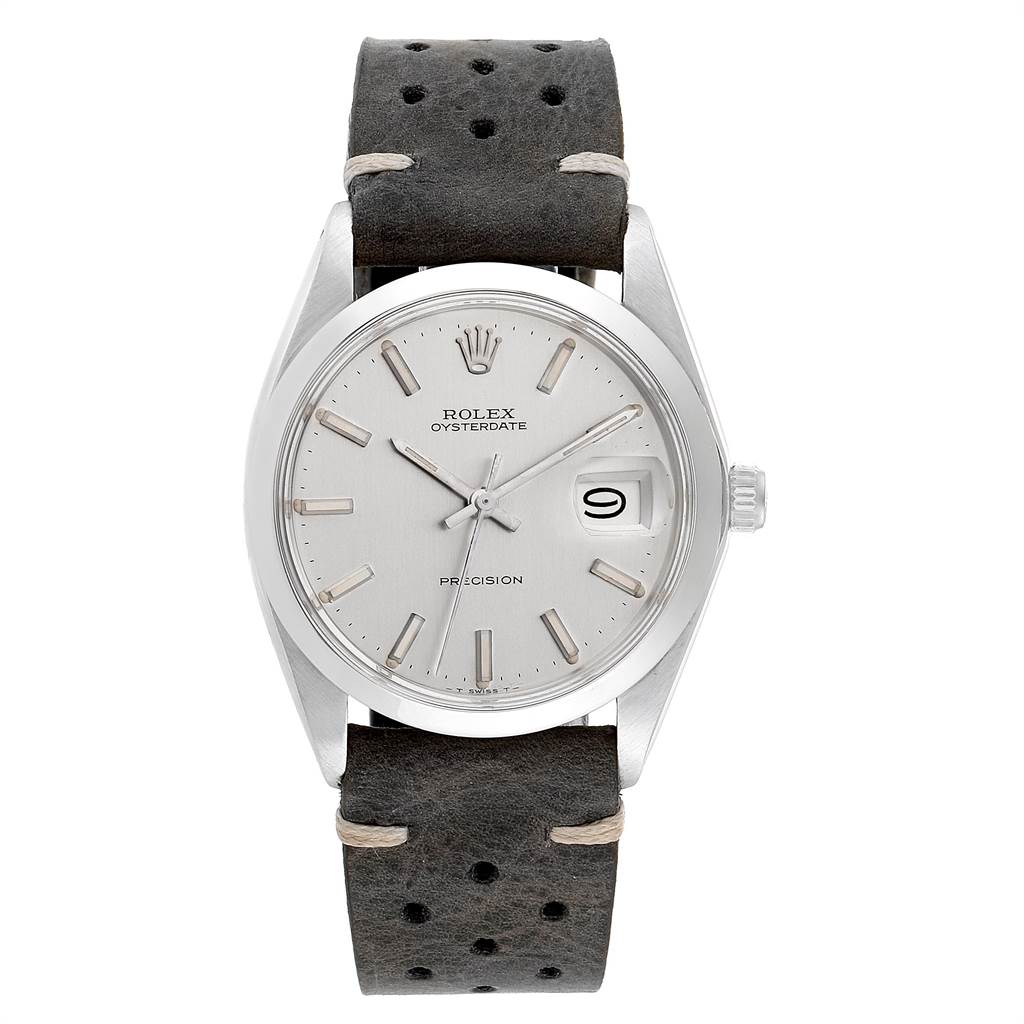 The image shows a front view of the Rolex Vintage Collection 6694 Men's Stainless Steel Silver Dial 6694 Men's Stainless Steel Silver Dial Oysterdate watch with a black perforated strap.
