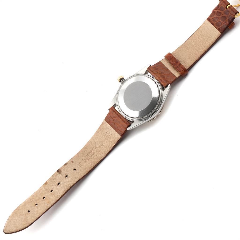 This image shows the back view of a Rolex Vintage Collection 15053 Men's Steel and Gold (two tone) Champagne Dial 15053 Men's Steel and Gold (two tone) Champagne Dial watch, highlighting the case back and brown leather strap.