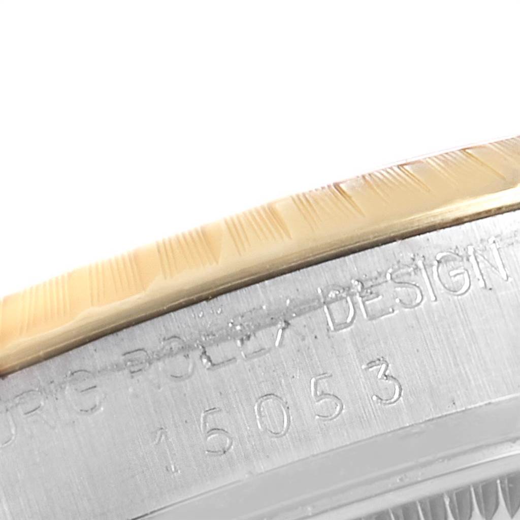 This image shows a close-up of the bezel and engraved case side of a Rolex Vintage Collection 15053 Men's Steel and Gold (two tone) Champagne Dial 15053 Men's Steel and Gold (two tone) Champagne Dial model, displaying part of the reference number.