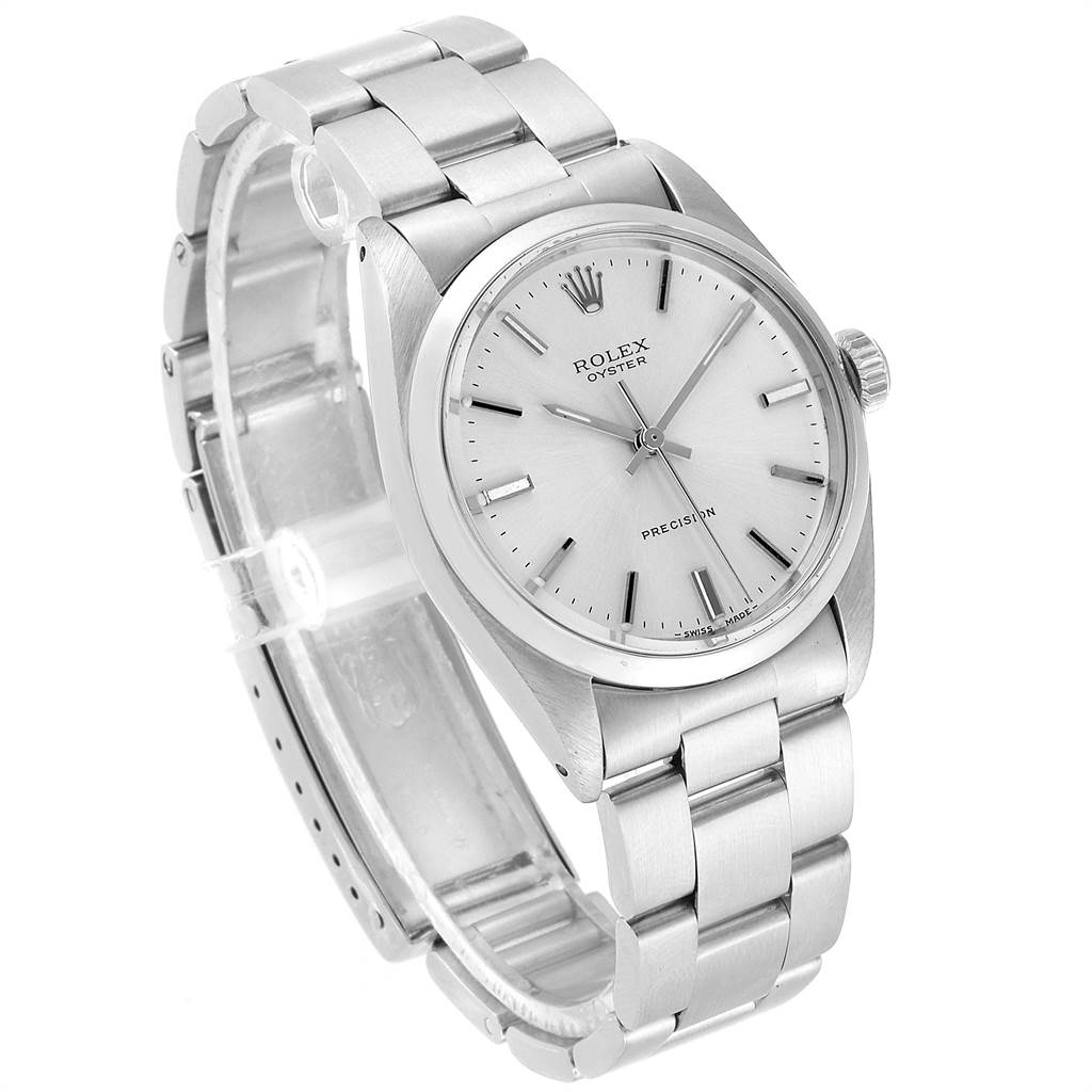 The Vintage Collection Rolex watch is shown at an angled side view, displaying its face, bezel, crown, and metal bracelet.