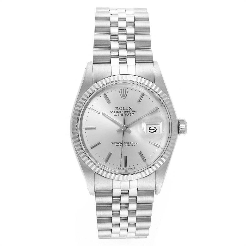 The image shows a front view of the Rolex Vintage Collection 16014 Men's Stainless Steel Silver Dial 16014 Men's Stainless Steel Silver Dial Datejust watch, displaying its silver dial, fluted bezel, and Jubilee bracelet.