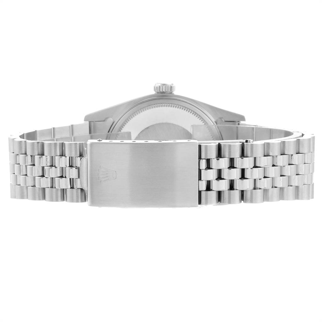 The image shows the back case, crown, and bracelet clasp of the Vintage Collection watch by Rolex.