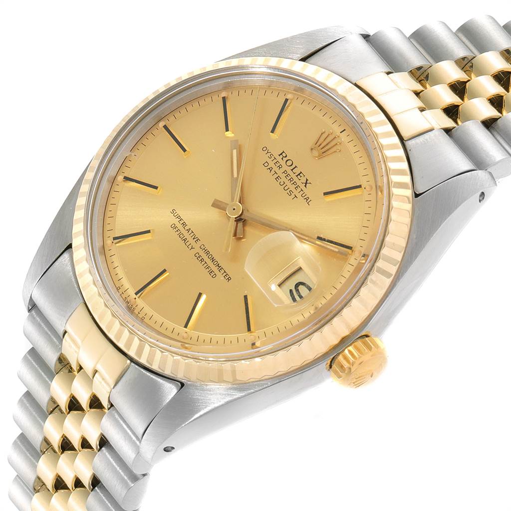 The image shows a close-up angle of a Rolex Vintage Collection 1601 Men
s Steel and Gold (two tone) Champagne Dial 1601 Men
s Steel and Gold (two tone) Champagne Dial Datejust watch, highlighting the dial, bezel, crown, and part of the bracelet.