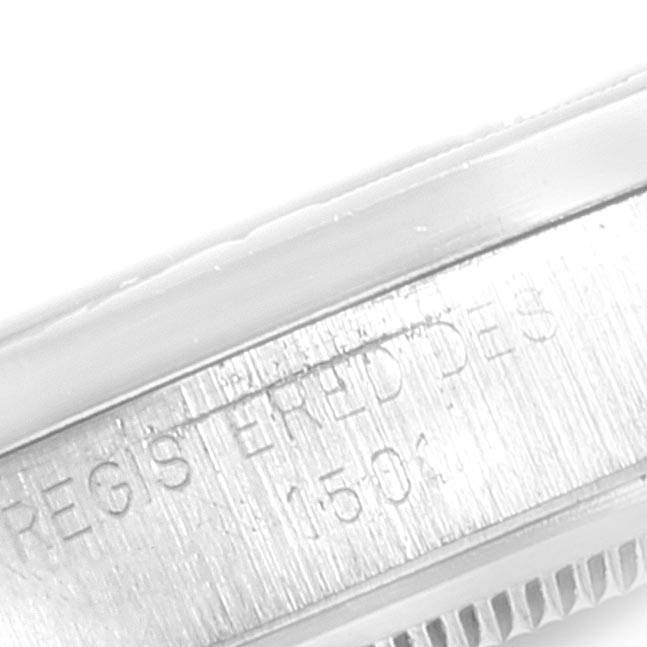 This close-up image shows the side case with engraving on a Vintage Collection model by Rolex.