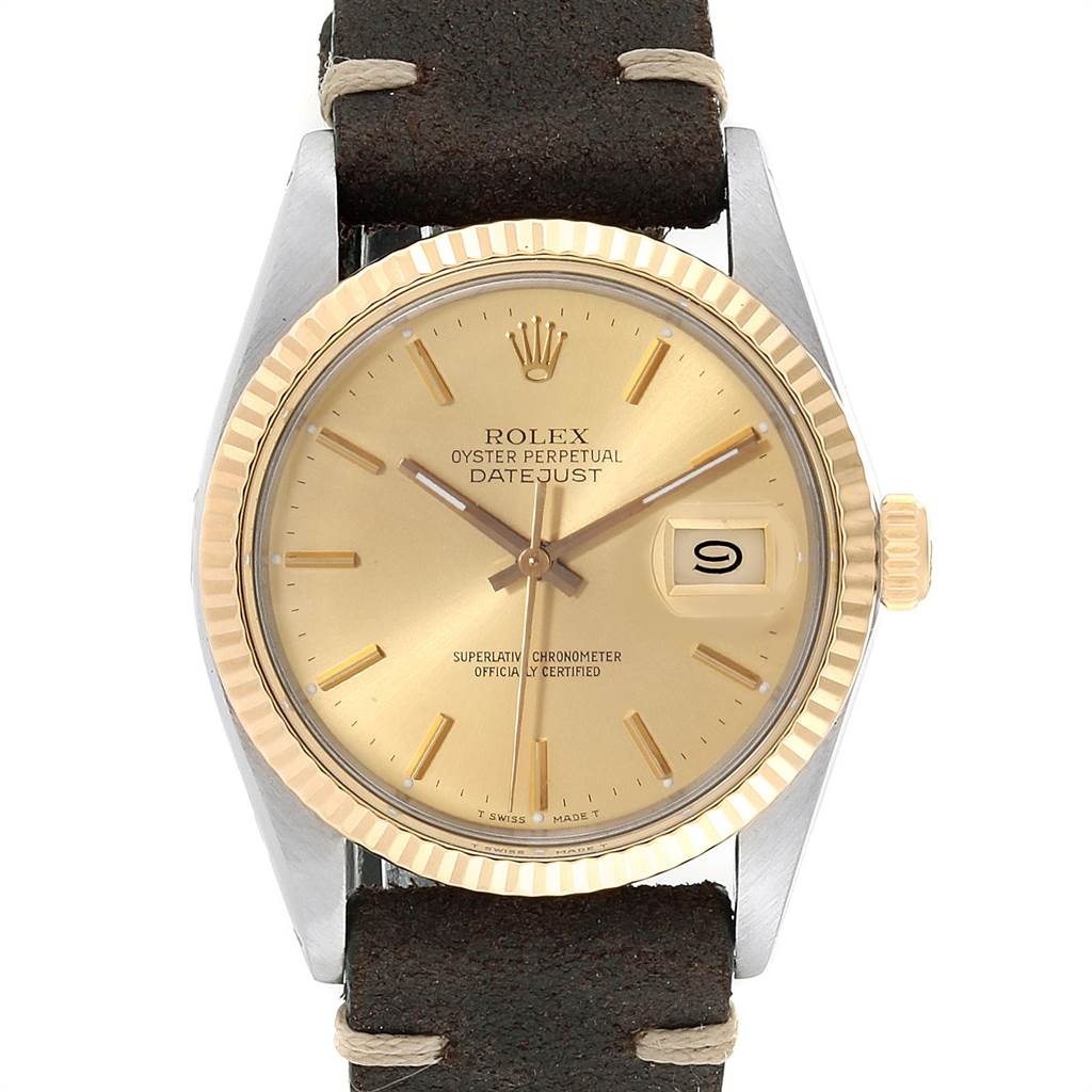 The image shows a frontal view of the Rolex Vintage Collection 16013 Men's Stainless Steel Champagne Dial 16013 Men's Stainless Steel Champagne Dial Datejust watch, featuring its dial, case, and part of the strap.